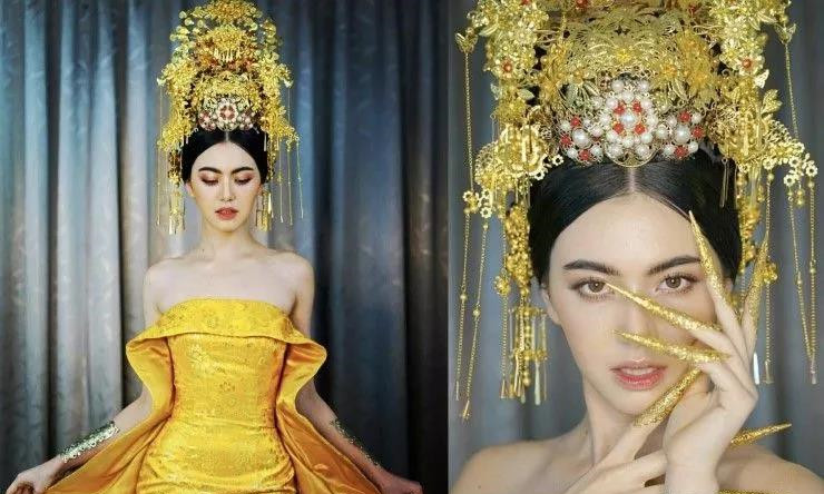 泰国当红女星Mai Davika这身“皇后黄袍”和范爷的龙袍装有的一拼!！！.jpg